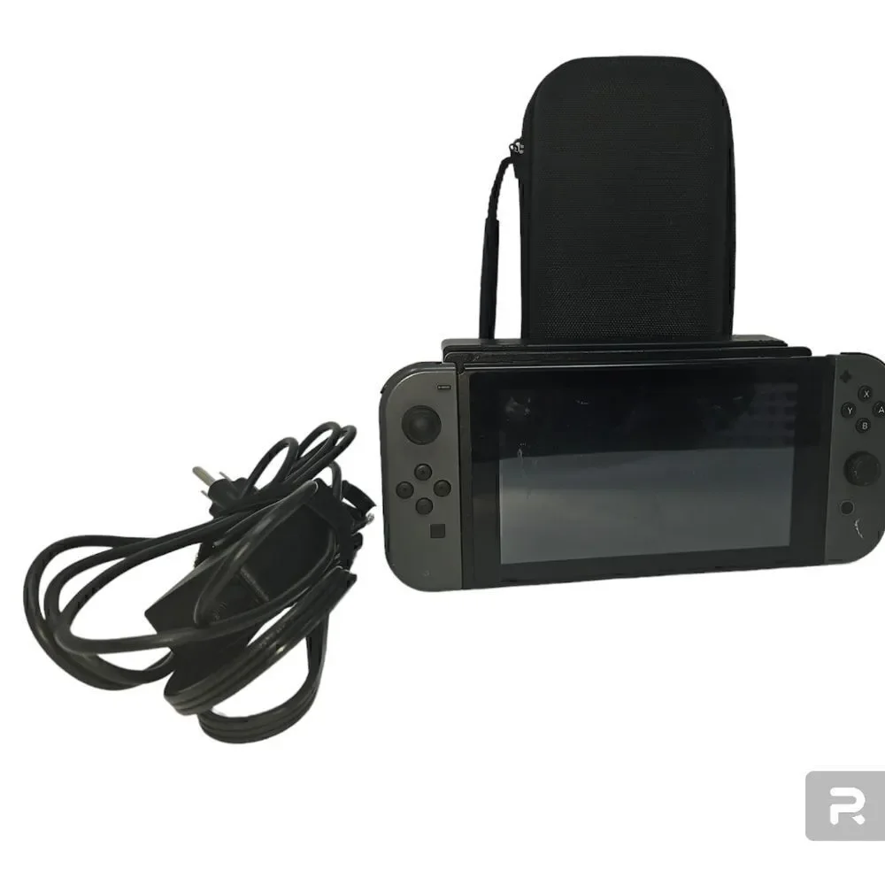 Nintendo HAC-001 Switch Gaming System w/ Blue & Red Joy Sticks